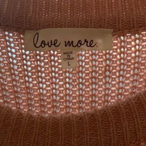 Size L shoulder cut out distressed sweater